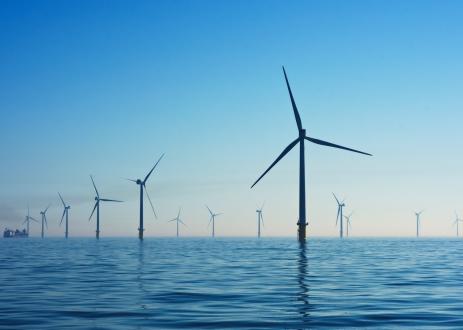 Wind turbines in the ocean.