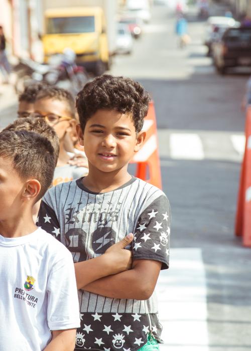 Kids waiting in line on street in Brazil